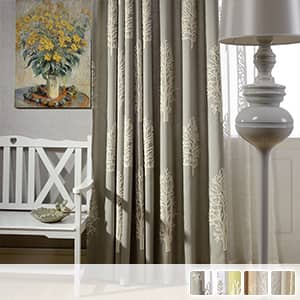 ポプラモチーフの糸刺繍を施し