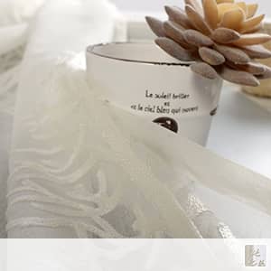 ポプラモチーフの糸刺繍