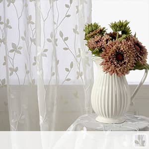 蔓モチーフを刺繍しましたレースカーテン