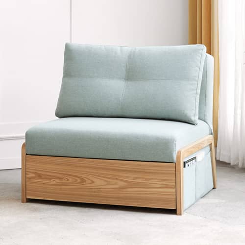 一人掛けソファが見えますが、すぐにベッドなる